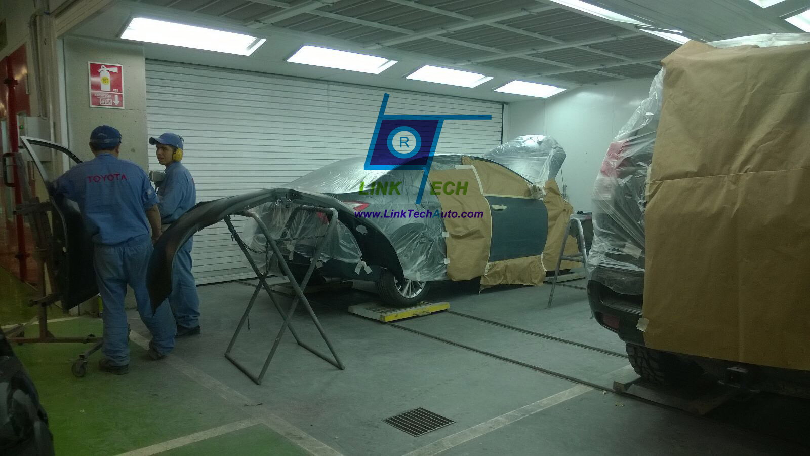 Paint booth with car trolley