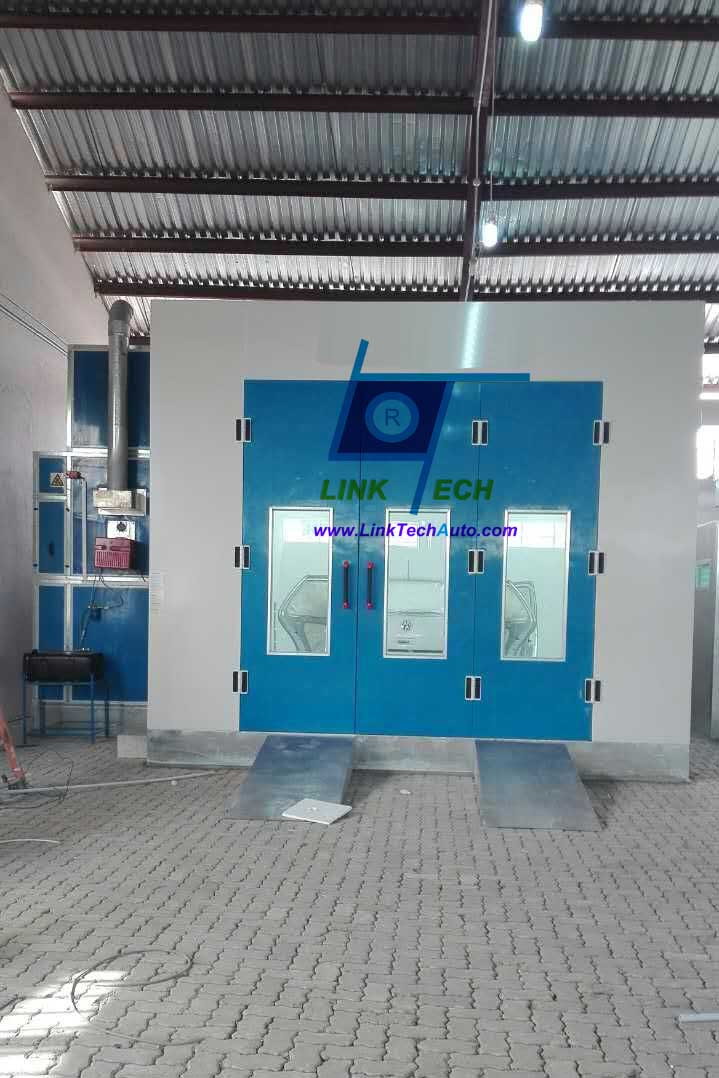 Paint booth with belt drive motor