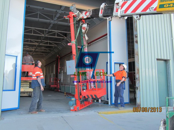 Truck spray booth with lifter